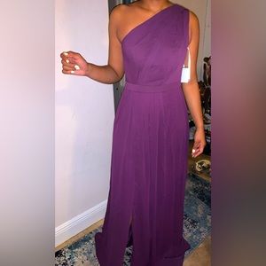 Plum colored David’s Bridal bridesmaid dress. Size 9 toga style gown.